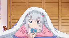 Emu Hojo hides under blanket