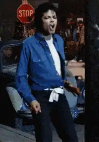 Michael Jackson dancing in blue shirt
