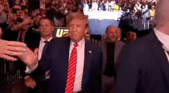 Donald Trump shakes hands at UFC 229