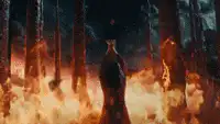 Woman in burning forest