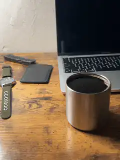 coffee cup steaming on desk