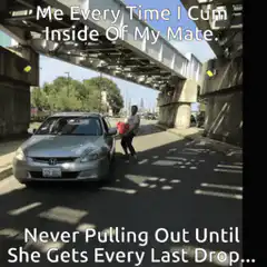 Man shaking red box by car