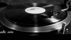 Spinning vinyl record on turntable