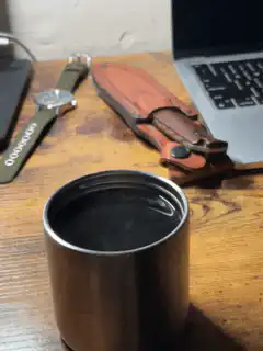 steam rising from hot coffee cup