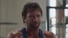 Chuck Norris pulls down a building