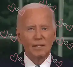 Joe Biden smiling with hearts