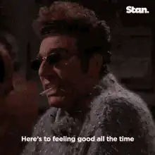 Stan drinking with cigarette
