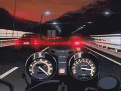 motorcycle speeding on highway at night