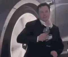 Elon Musk talking with Tesla microphone