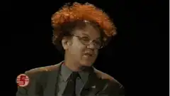 John C. Reilly with red afro wig