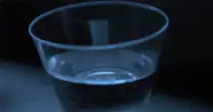 Blue tinted water in a glass