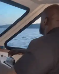 Shaquille O'Neal boat finger wag