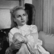 Carole Lombard makes a disgusted face
