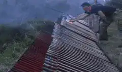 Man lights long line of rockets