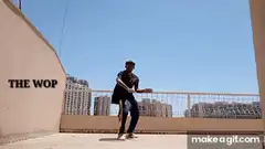 Man doing the wop dance on a rooftop