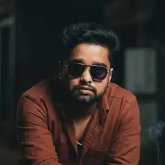 Man in sunglasses with smoke