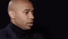 Thierry Henry nodding and smiling