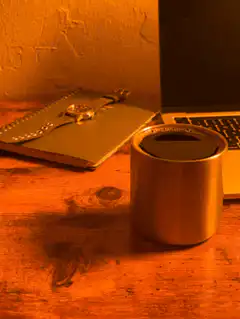 Coffee cup on wooden desk