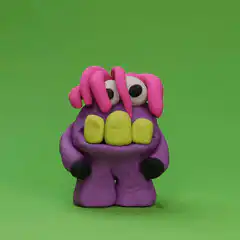 purple clay monster with pink hair