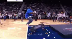 Man does backflip off trampoline into basketball hoop