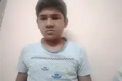 Boy makes angry face and gestures