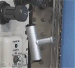 T-shaped tool hitting power button