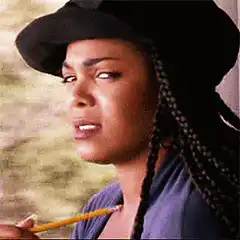 Toni Collette looking skeptical with a pencil