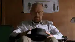 Walter White holding a hat