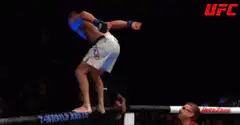 UFC fighter backflip over the cage
