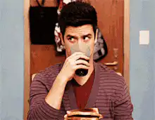 Blindfolded man drinking