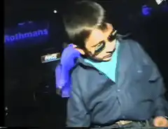 Michael Jackson dancing in blue jacket