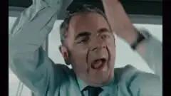 Mr. Bean driving and singing