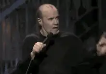 George Carlin talking on stage