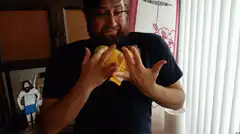 Man juggling fruit
