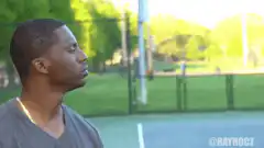 Man catches tennis ball on finger