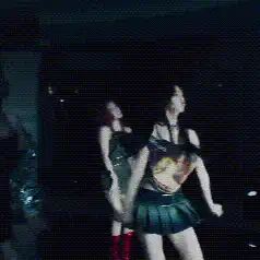 K-pop girl group dancing on stage