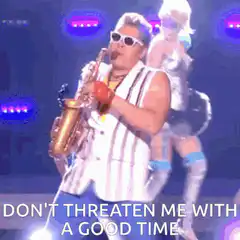 Bruno Mars playing saxophone on stage