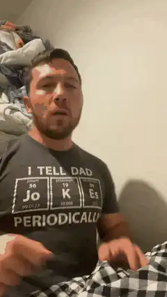 man folding laundry periodically
