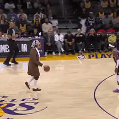 Colonial man dribbles past Lakers players