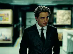 Robert Pattinson walking and looking confused