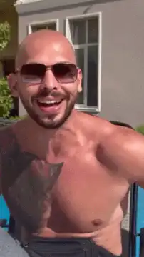 Shirtless man laughing with ha text