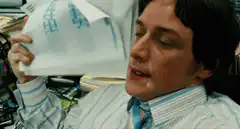 James McAvoy blowing on a bag of ice