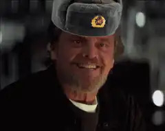 Jack Nicholson smiling in a ushanka