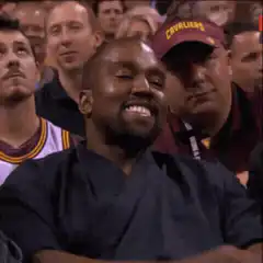 Kanye West smile turns to serious