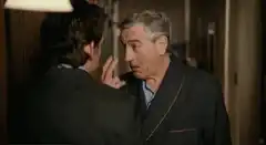 Robert De Niro pointing at nose