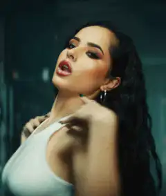 Becky G posing and dancing