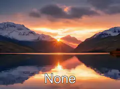 Sunset over mountains and lake