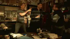Three men arguing in a dimly lit office