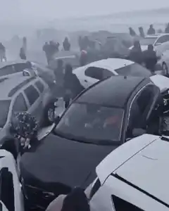 Massive car pileup on snowy highway