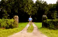 man running from car